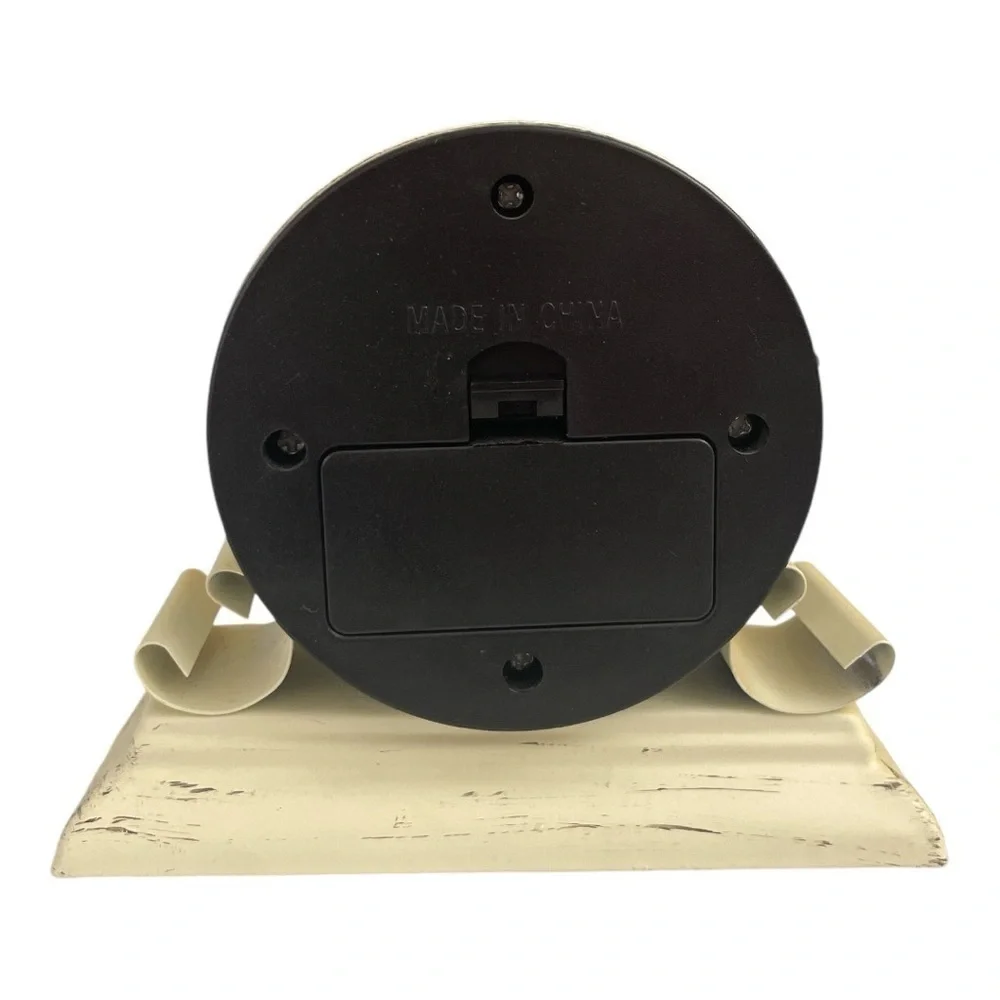 Kirkland’s Distressed Ivory Metal Tabletop Clock